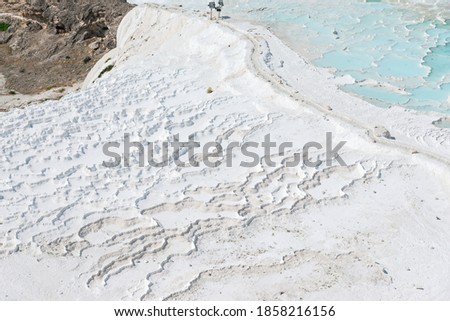 Aerial view of the area of white salt and carbonate in Pamukkale, which means "cotton castle" in Turkish, is a natural site in southwestern Turkey.