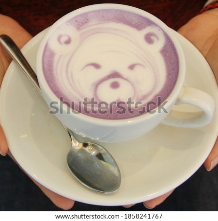 Bear picture on taro latte with milk skim