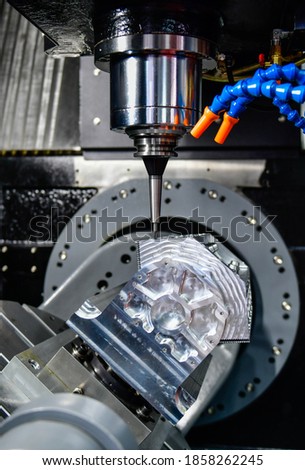 The 5-axis CNC mills machines for design configuration that utilizes a swivel head machine table and flush with the surface metalworking industrial