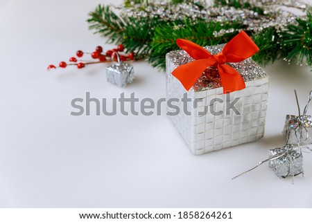 New Year or Christmas background with branch of red holly berries. Copy space.