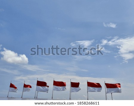Indonesian flag in the blue sky