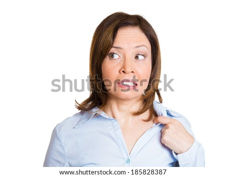 Closeup portrait, mature business woman opening shirt to vent, its hot, unpleasant, awkward situation, embarrassment. Isolated white background. Negative human emotions, facial expression, feelings Royalty-Free Stock Photo #185828387