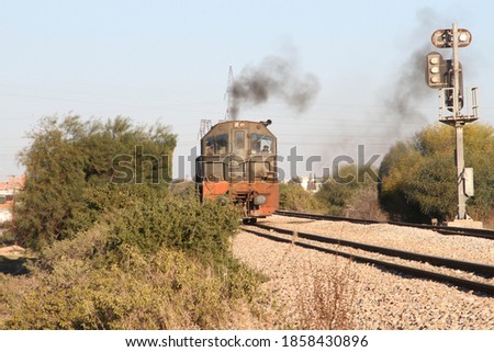 This is a picture of a railway and a train
