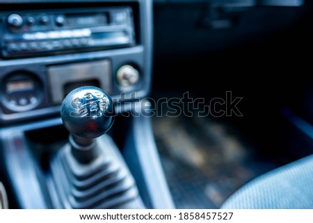 Gear shifter on old, used , vintage japanese 4wd car, space for text.