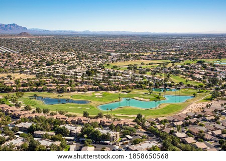 Aerial view of a mature golf course in an upscale community in east Mesa, Arizona Royalty-Free Stock Photo #1858650568