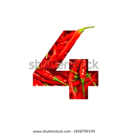 Number four made of red chili pepper, paper cut in shape of fourth numeral isolated on white. Typeface of vegetables