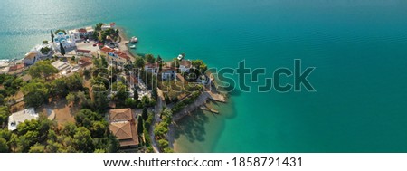 Aerial drone ultra wide panoramic photo of picturesque seaside village and bay of Porto Heli a safe anchorage for yachts and sailboats, Argolida, Peloponnese, Greece