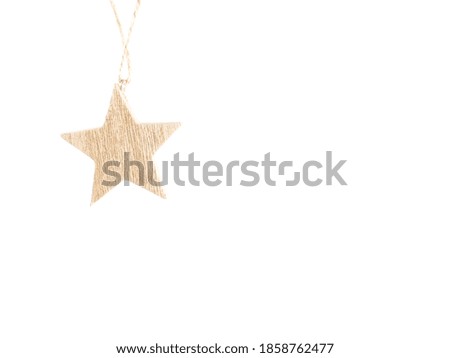 Brown wooden Christmas star decoration isolated on white background