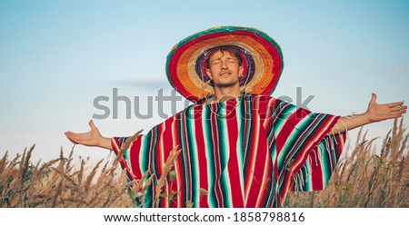 Nature travel vacation. Man big hat. Travel concept. Life. Funny photo. Male. 
