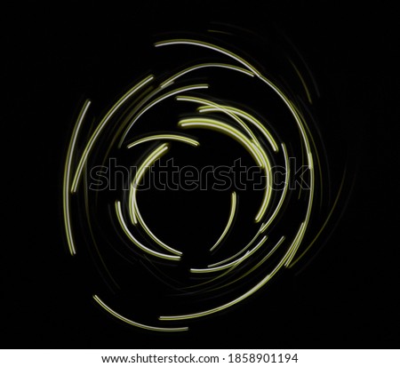 Yellow neon circle shape light isolated on black background
