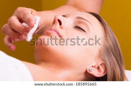 Woman is having cosmetic treatment at beauty salon. Royalty-Free Stock Photo #185895665