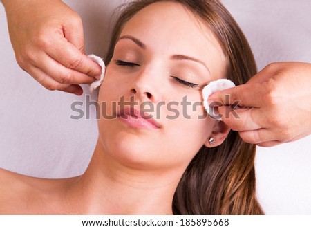 Woman is having cosmetic treatment at beauty salon. Royalty-Free Stock Photo #185895668