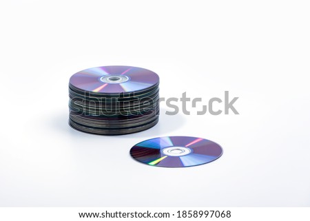 CD and stack of Compact Discs isolated on a white background