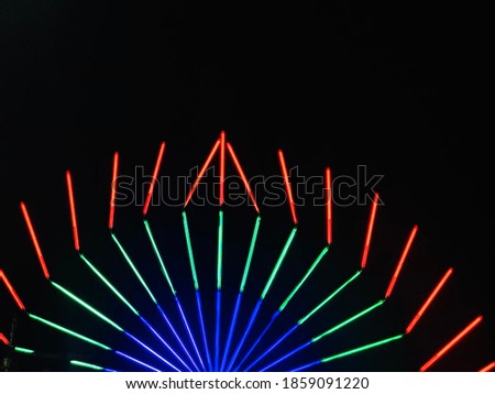 Colorful decorative lights on black background, celebrating day
