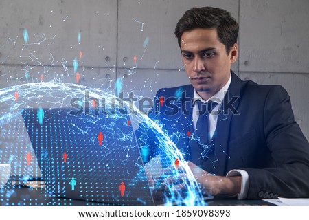 Businessman in office working with laptop, develop networking chain to push new social media project, typing computer. Double exposure.