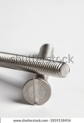 Metal bolts close-up on white background