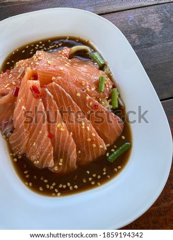 Salmon hot and spicy salad Royalty-Free Stock Photo #1859194342