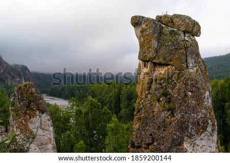 Stone on the shaman's path in Khakasia in the fog Royalty-Free Stock Photo #1859200144