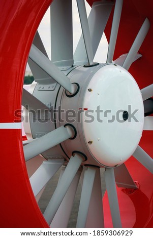 A close up picture of the rotor blades of a helicopter