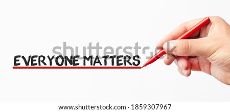 Hand writing Everyone Matters with red marker. Isolated on white background. Business, technology, internet concept. Stock Image