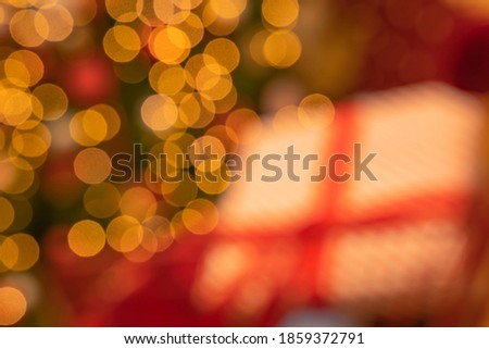 Christmas lights fire place in cozy and warm home December holidays unfocused abstract orange and yellow colors concept photography 