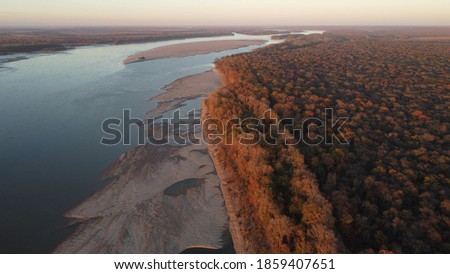 Aerial drone imagery of landscape, forests, mountains, riverfronts, sunsets and seasonality