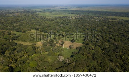 Aerial view of the ancient Olmec city of La Venta, with its towering Great Pyramid and surrounding jungles. Royalty-Free Stock Photo #1859430472