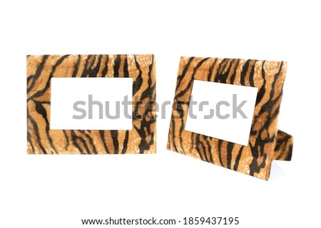 Fur tiger photo frame isolated on white