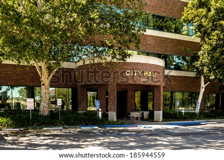 The City Hall building of Santa Clarita, CA is a multiple story brick and concrete structure. Royalty-Free Stock Photo #185944559