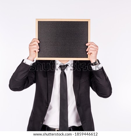 businessman in black suit. emotions, facial expressions, feelings, body language, signs.