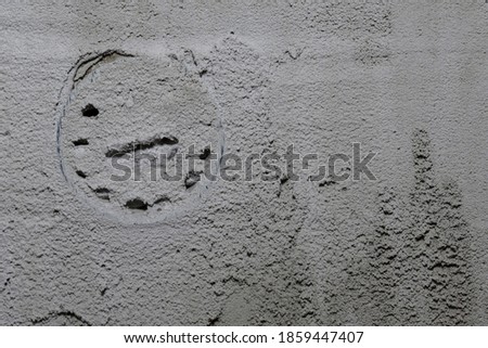 Grey background made with a texture of a plaster wall