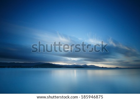 Long exposure dramatic tropical sea and sky sunset