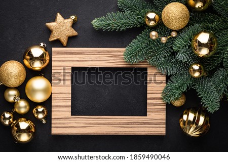Empty Photo Frame Christmas New Year Background Over Black Concrete Backdrop. Gift Card Greeting Design Mock Up