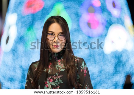 Portrait Beautiful Asian woman with Bokeh blur background