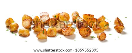 Roasted baby potatoes isolated on white background.  Royalty-Free Stock Photo #1859552395