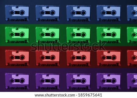 Music tapes on a colorful background.
