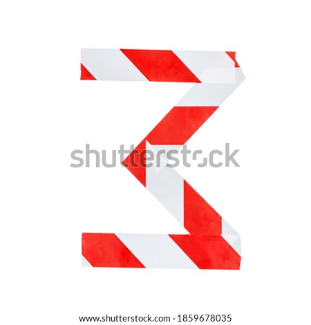 Number 3 is made of red and white warning tape. Isolated on white background