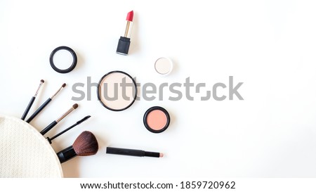 Makeup beauty cosmetic fashion set background. Cosmetics woman bag product facial, lipstick  and items decorative composition flat lay on white background.  Lifestyle fashion Concept
