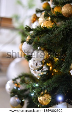 Christmas tree decoration in gold colors