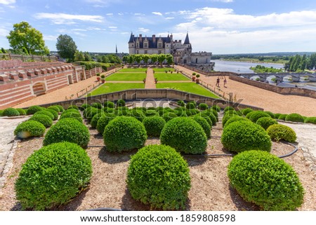 Beautiful garden and Castle Chateau d'Amboise by sunny day, Loire Valley, France. Royalty-Free Stock Photo #1859808598