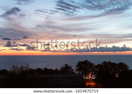 Landscape of the evening blue sky with clouds over the ocean by the sunset on the abstract clouds pattern background, refer to the hope and freedom of the future