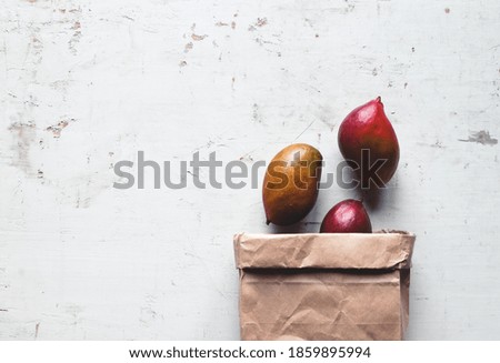 Mango in a Brown Paper Bag. Healthy food, healthy lifestyle. eco