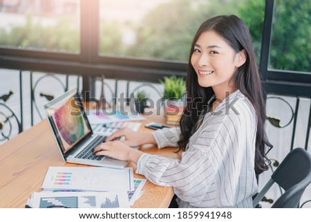 Asian woman Graphic Design Studio Drawing Ux Ui Website Technology Creative Occupation freelance advertisement marketing creating user interface with tablet computer agency working happy smiling