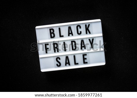 Black friday sale concept at black background. Top view.