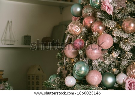 Christmas tree with toys and garland