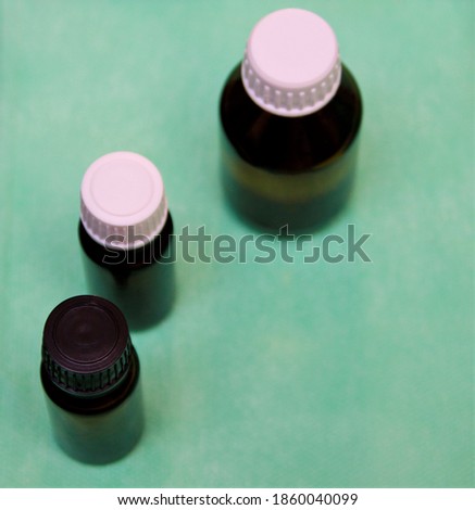 essential oil on a green tablecloth