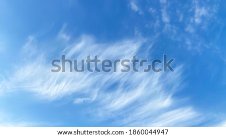 Blue sky with white clouds moving in the wind - sunny day and blue sky