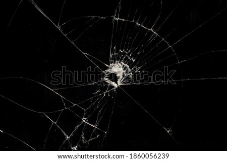 Broken glass with cracked on black background
