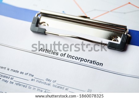The document Articles of Incorporation is ready for signing. Royalty-Free Stock Photo #1860078325