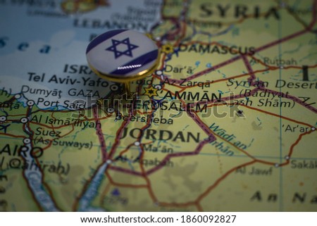 Jerusalem pinned on a map with the flag of Israel